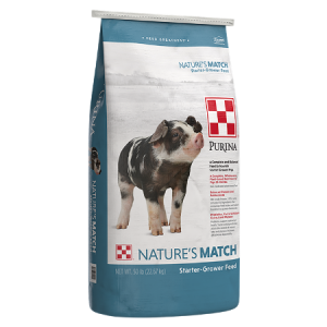 Teal and white 50-lb feed bag. Purina Nature's Match Starter-Grower Pig Feed